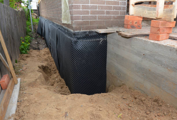 Happy homeowners after waterproofing job in Raritan